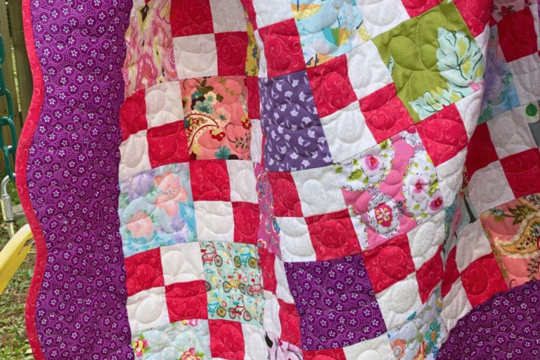 4 patch quilt pattern make in purples, greens and pinks