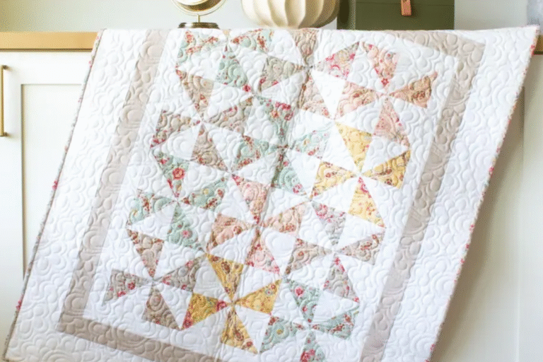 Pinwheel baby quilt pattern in soft colors