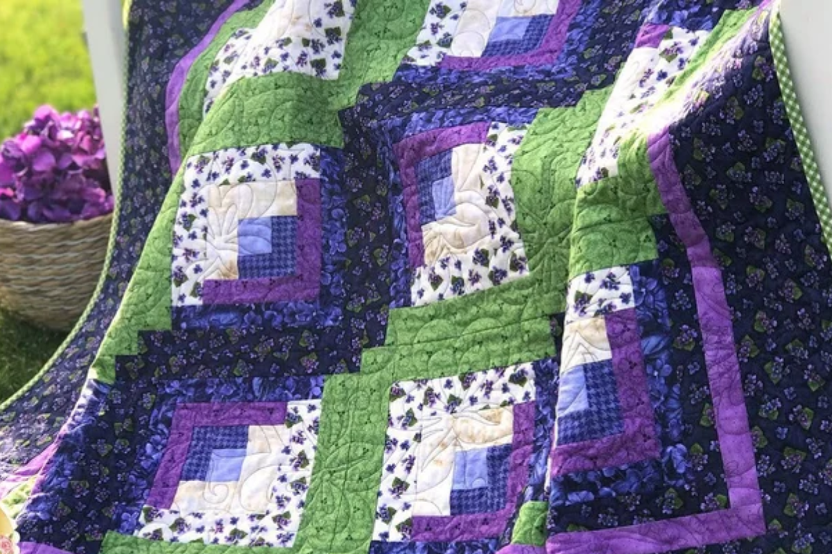 purple quilt pattern in a log cabin quilt pattern